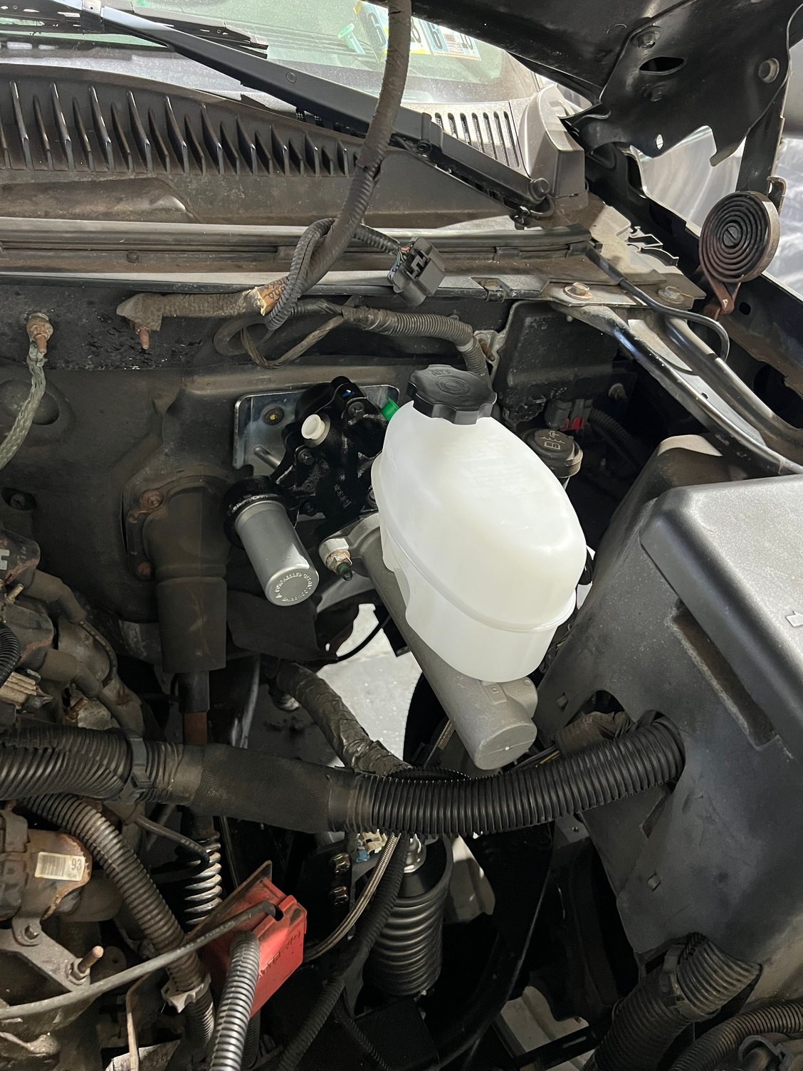 3 bolts holding it in so I can work on the brake pedal. 