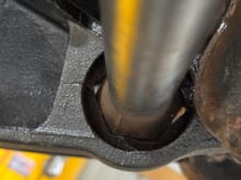 Other than having the grind the bump stop pad to clear the shock, the only concerning thing on this Detroit axle lower control arm is the gap in the torsion bung. You can see light coming through it in a couple spots in this pic, it’s not like this on the factory part. 
