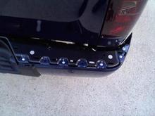 rear bumper pre-rivoting