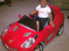 My little guy with his 1st Birthday present.