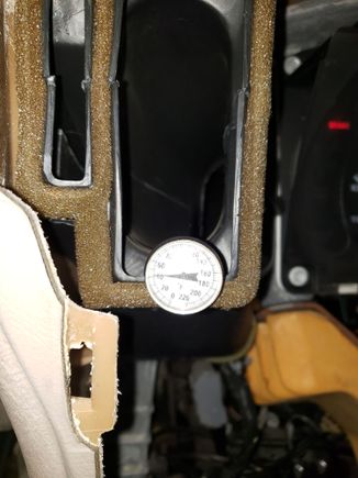 Vent temps in 102°F from the left vent after idling for ~10 minutes with the puller fan running, both blowers on high and using recirculate. Center vent was 38°F.