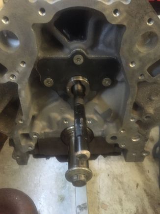 Didnt have much time today so went ahead and installed cam, and retainer plate.. And put a regular non vvt cam reluctor on it just to prevent the cam from mysteriously finding its way out the back of the block, at least until i can find time to oull the engine off the stand and get the rear cover installed