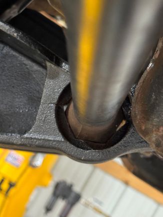 Other than having the grind the bump stop pad to clear the shock, the only concerning thing on this Detroit axle lower control arm is the gap in the torsion bung. You can see light coming through it in a couple spots in this pic, it’s not like this on the factory part. 