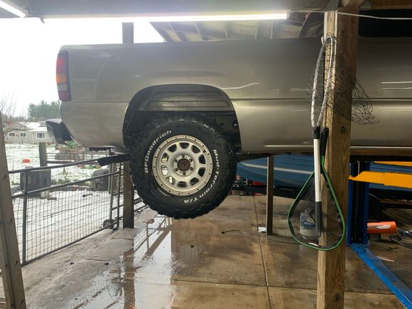 Spare 35” tire test fit on the truck. 