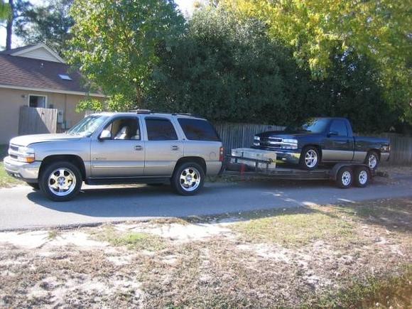 Tahoe pulling truck on 20' trailer