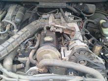 The engine bay, as I saw it when the hood was lifted.