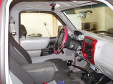 Here's the interior. I've done a lot of work to it. See if you can spot all of the mods!!

1. 04-05 Seats
2. Driver side oh-sh*t handle
3. Painted radio bezel
4. Level II Chrome shifter w/ a Hurst knob
5. Light switch panel
6. 01 Sport Trac 2WD Gauge Cluster
7. Cut up shifter boot :P
9. Pioneer radio w/ Sansa 8GB MP3 player hooked up to it. The MP3 is attached with velco. Then I bought a USB charger for the lighter plug.
8. Steering wheel cover for extra grip, my hand kept sliding off the wheel
9. GPS mounting pad

Last thing to do is OHC. I bought one, I just need to get a sunglasses holder for it and the screws to mount it up.