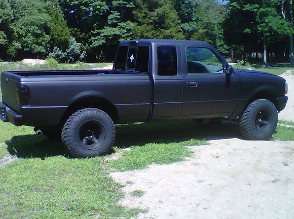 rustoleum flat black 3 coats, removed all plastic fenders and emblems, tinted tail and 3rd brakes lights black
