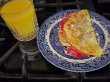 Ham, cheese, tomato. Green tabasco sauce With grated cheese. 
