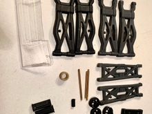 Spare arms, wing, shock shafts, arm inserts, shock cups, etc