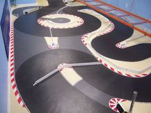 There are three different routes that can easily be changed. The main route stays on the black surface. The other two routes use the gray areas.