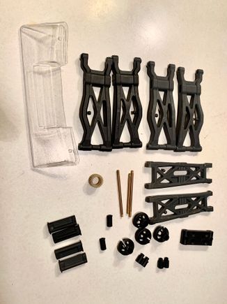 Spare arms, wing, shock shafts, arm inserts, shock cups, etc