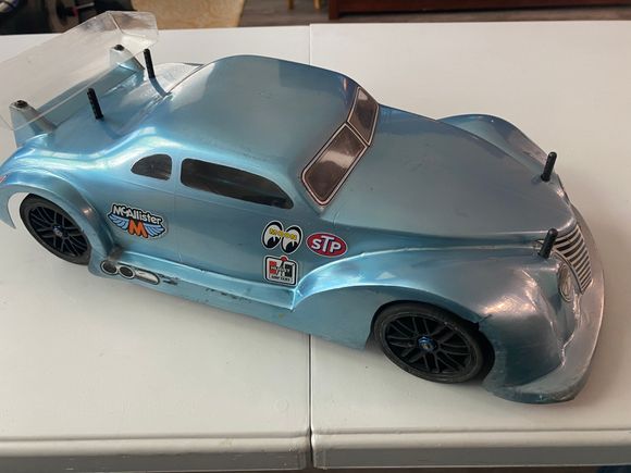 McAllister body, forget the model. In tact but good amount of road rash on the front and whee wells. 