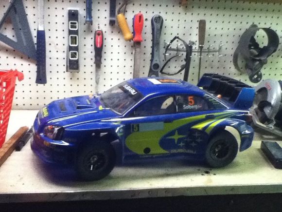 Slash 2wd with Kyosho Inferno Gt STI body.
