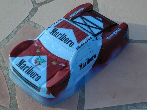 JConcepts Illuzion 2012 Silverado 1500 Hi Flow painted by Chris Moore of CMDezigns. Blue film &amp; window masks not removed yet.