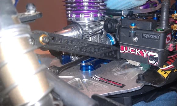 Mugen mbx6t rear chassis brace modded to fit my st-rr, and then drilled to offer additional torsional flex while not losing strength for front to back impacts....best st-rr rear brace ive tested, and ive tried alot!!