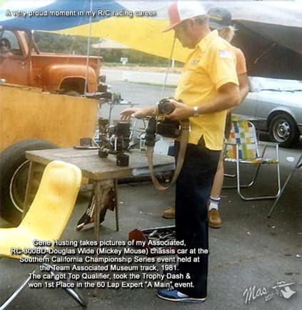Gene Husting, Owner of Associated RC Cars takes photo of Tom Douglas's Associated RC 300 Wide Chassis car, better known as the Mickey Mouse chassis.