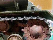 Test run outdoors revealed a gap between the upper and lower hull that allowed debris that is prone to being grabbed by the rear drive sprockets to enter the tank in the area of the transmissions. The white line above the track is actually light being reflected through the tank.