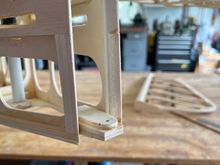 I started by putting balsa pieces to bridge very rear outsides.  Then you can see the lower hinge on a balsa wedge