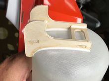 Rear tank mount hooks under wing tube