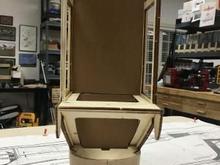 It took less than an hour to trim some cardboard to fit. Not only will this be used to cut the plywood pieces, but also to mask the electronics when I spray the cockpit interior silver.