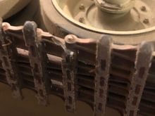 Snapped off a section of track cleat and shortly after the link broke. 