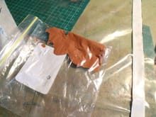 Epoxy micro balloons in the piped into the corners with zip lock bag with corner cut off.