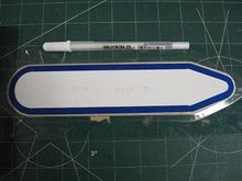 White pen used to place index marks for overlay panel centering -