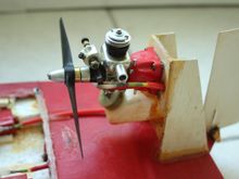 Tee Dee .051 with Tarno Carburetor, and possibly a Tatone muffler. A Sullivan 1oz fuel tank was used rather than the engine mount tank. 