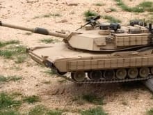Teaser. This is a highly modified Abrams that will be tested during the next evaluation of the test course. Here seen getting "air" after driving over a shovel handle near at speed. 