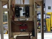 To support the "floor" I cut 10 3/8" cubes from leftover basswood spar material, shown here glued to the fuse sides.