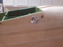 The hole I  use for the linear servo matches full scale a bit. I have no idea what it is. I can't figure it out on full size pictures.