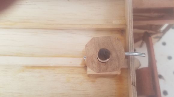 Close up of locked location and assembly. Pin goes through collar and dowel. To remove the assembly just pull the pin out.