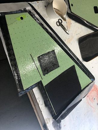 The inner layers of carbon fiber reinforcement on the top wing skin are put inplace on the airex core.  These reinforcement pieces are around the main landing gear mount and the servo mount. 