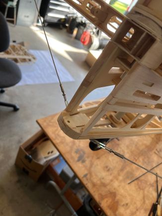 Better angle on the wires, no added structure for the bottom anchor, doesn't penetrate the covering.