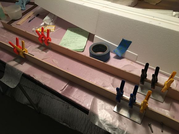 Gluing angle aluminum to the vertical spine. 