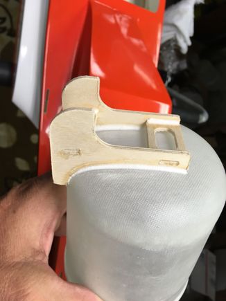 Rear tank mount hooks under wing tube