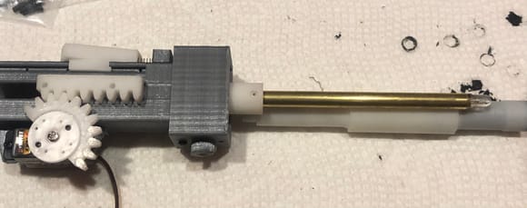 Use a brass 6.35mm diameter barrel support rod in place of the nylon rod provided with the turret kit. I also added a barrel flash LED bulb.