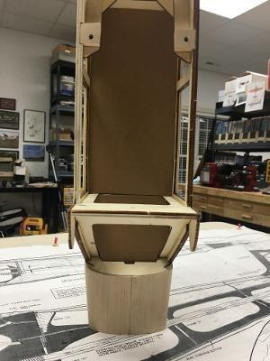It took less than an hour to trim some cardboard to fit. Not only will this be used to cut the plywood pieces, but also to mask the electronics when I spray the cockpit interior silver.