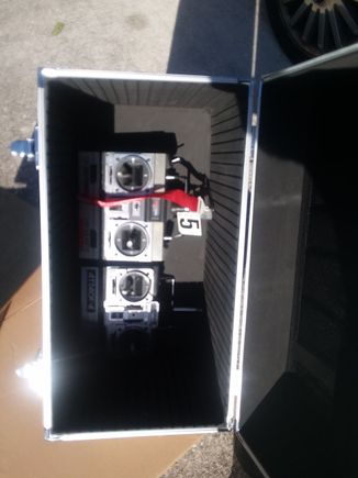 here are two standard sizes transmitters side by side in the bottom of the case.