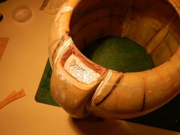 Bondo troweled in against Vaselined plug stop.