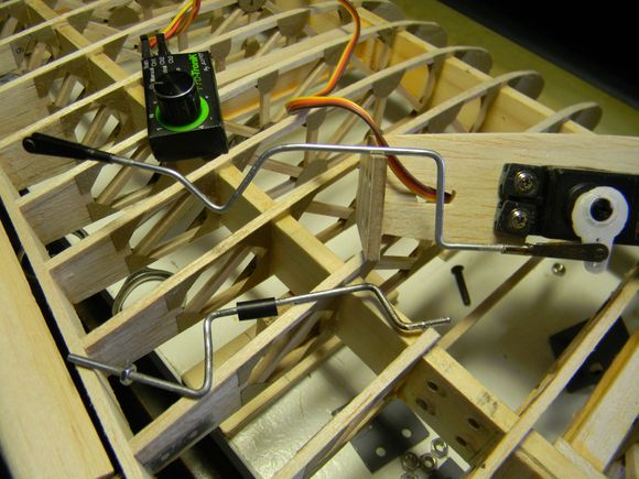 New aileron push rod attached to servo. It replaced the one below it. 