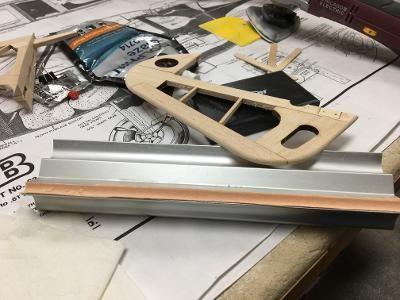 Here it is: an 11-inch, extruded aluminum contour support for sticky sandpaper. Not much use for these when all you're doing is assembling ARFs.