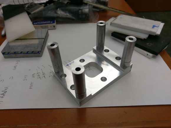 Aluminum mounting plate with 3 deg down, 2 deg right thrust.