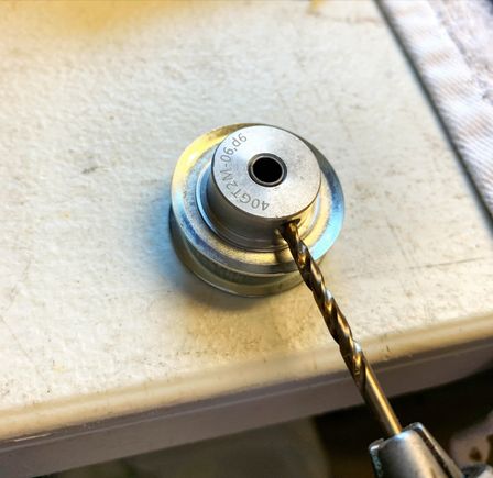 Then I used a 3.2mm drill bit create holes in the spacers, while trying not to hit any threads for the set screws.