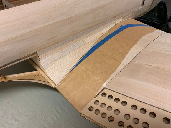 Lots of tiny pieces.  I saw where Kalima (midastouch73) on RC Scale used ply instead.  I think I'd like to try that next time.  I have used Superfil to thin coat over this area.  I find it earier to sand/contour and really adds strength along the edge.