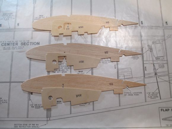 Before I can start assembling the wing, three ribs (W4, W5 & W6) which support the retracts, must be reinforced by epoxying 1/16" rib doublers to their sides.