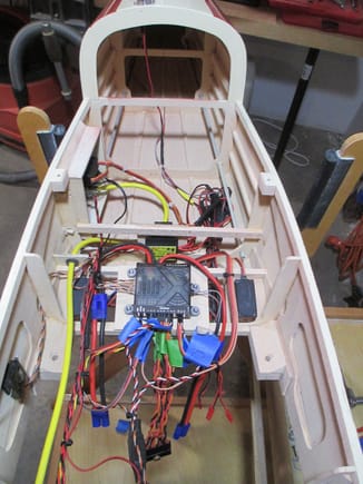 Top view of the wiring harness.  Everything  from this view will be covered over by the bottom of the cabin interior making anything accessible not an option.

Note: All the tape on each wire will be replaced with a much neater tape from a label maker.
