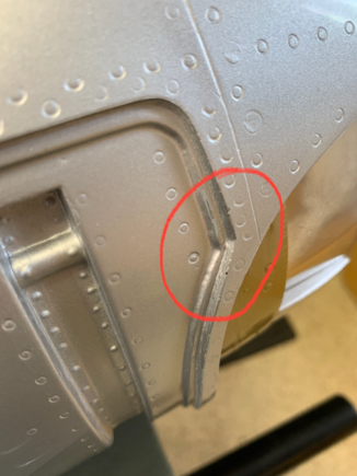 Binding in this area, both sides (taken after sanding and touchup paint)