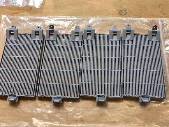 Front grills primed, ready for olive drab paint.